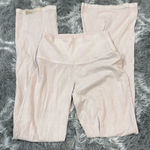 Aritzia tna baby pink flared high waisted leggings size Xs Has some staining a Photo 0