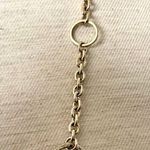 Long silver tone necklace with circles Photo 5