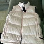 The North Face  vest light pink with grey inside lots of pockets Photo 0