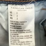 American Eagle  Medium Wash Distressed Highest Rise Mom Shorts Photo 6