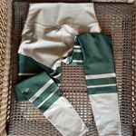  high waisted green striped leggings / Alo Yoga Highwaist Airlift Legging Photo 1