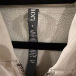 Vuori  Women's Restore Full-Zip - color: Salt - size Small. Photo 7