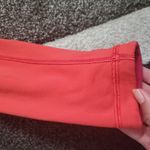 Lululemon  athletica reversible leggings in orange and  red in size 4 Photo 6