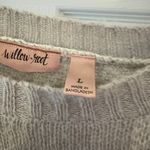 Buckle sweater Photo 1