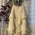 Saints + Secrets Romper Photo 2