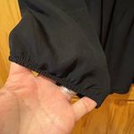 Mary Square V neckline and a gathered, peplum Photo 3