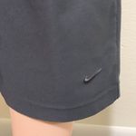 Nike  woman gray flare leggings below calf 23” inseam size SMALL 4-6 Photo 1