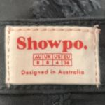 Showpo Black Distressed Denim Skirt Photo 4