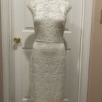 Mystic White lace dress with open back. Photo 5