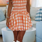 Josie's Boutique  Orange and White Smocked Bubble Dress Photo 0