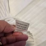 Bellini Ribbed Form Fitting White Cardigan with Gold Accents Photo 5