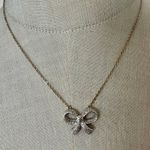 PAJ Silver and gold Tone Textured Bow Pendant Necklace Photo 1
