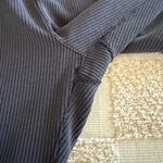 Lululemon  Ribbed Softstreme Zip-Leg High-Rise Cropped Pants 25"
Black
Size 10 Photo 3