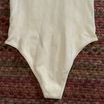 OQQ CREAM SEAMLESS ONE SHOULDER CUT OUT BODYSUIT Photo 3