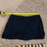 Princess Polly mini skort with a side slit and zipper in the back. size 0 Photo 7