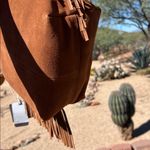 Haute Hippie | Honey Tan Suede Bucket Bag w/ Fringe and Adjustable Buckle Photo 8