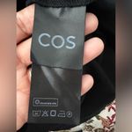 COS  black cotton spandex ruffle sleeve shirt size small Photo 4