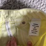 PacSun Ripped High Waisted Denim Festival Shorts. Size 26. Lemon Lime color. NWT Photo 2