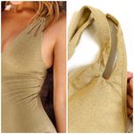 Becca gold metallic deep V neck low-back onepiece Photo 7