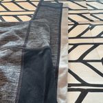 Athleta  Colorblock Revelation Tight in size small Photo 6