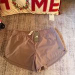 New Balance  Women's Athletic Shorts in Taupe Photo 1