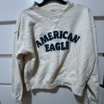 American Eagle Outfitters Cream Crew Neck Sweater Photo 0