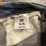 EXPRESS Skinny Mid Rise Distressed Jeans Photo 8