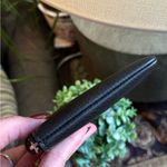 Coach Limited Edition🔥Authentic  pebbled leather zip top wristlet "Wonder woman" Photo 6