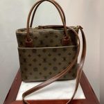Rosetti purse. Dark taupe with brown leather handles and strap. Super cute Photo 1