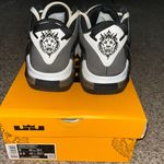 Nike (Size 9.5 Women’s/Size 8 Men’s)  Lebron Witness VII White/Metallic Silver-Black Photo 3