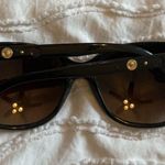 Versace | Stylish Black Sunglasses with Gold Accents Photo 0