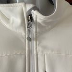 The North Face  white jacket only been used twice white with gray trim no stains Photo 3