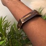 Unisex Geometric hexagonal Brown tan wooden bangle bracelet #streetwear #grunge #boho #hippie Approx 2.5” diameter Great for layering Has some marks, scratches Photo 0