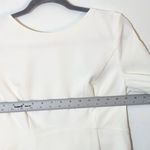 Lulus  Ivory Long Sleeve Mini Cocktail Dress with Back Bow Detail Size Medium Photo 11