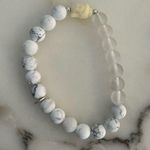 New Marlyn Schiff White Beaded Bracelet with Buddha Charm Photo 0