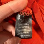 Alphalete  Aspire Signature Long Sleeve‎ Tie Small Dark Orange Soft Cropped Photo 3