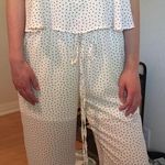 Dottie Couture Boutique white pattern jumpsuit Photo 0