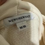 We Wore What  cream hooded sweatshirt with front pocket size Medium Photo 3