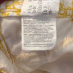 Old Navy Yellow Floral Cropped Pants Photo 6