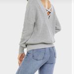 Sparkle & Fade Criss Cross back Oversized Sweater Photo 1