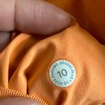 Lululemon Athletica Orange Raincoat with Hood and Water-Resistant Fabric Photo 11