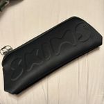 SKIMS NWT Neoprene long zip pouch Photo 0