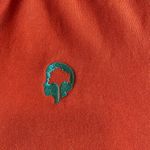 REI Cooperative x Outdoor Afro Size medium orange polo collared shirt Photo 1