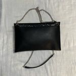 Torrid Elegant Black Lace Cutout Combo Clutch and Crossbody with Silver Background Photo 3