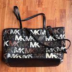 Michael Kors Jet Set Travel Medium Carryall Tote Designer Animal Print Gold Used Photo 0