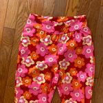 Pink orange red white floral 70’s groovy flare pants Size XS Photo 2