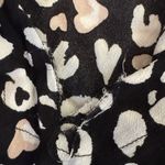 Free People NWOT Cheetah Bare It All bodysuit - hygienic sticker - vneck repair Photo 9