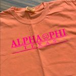 Alpha phi T Photo 1