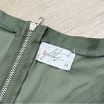 Glitz Women's Green Cold Shoulder Top Photo 1