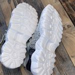 Stylish Gray and Black Athletic Shoes for Women Size 8 Photo 4